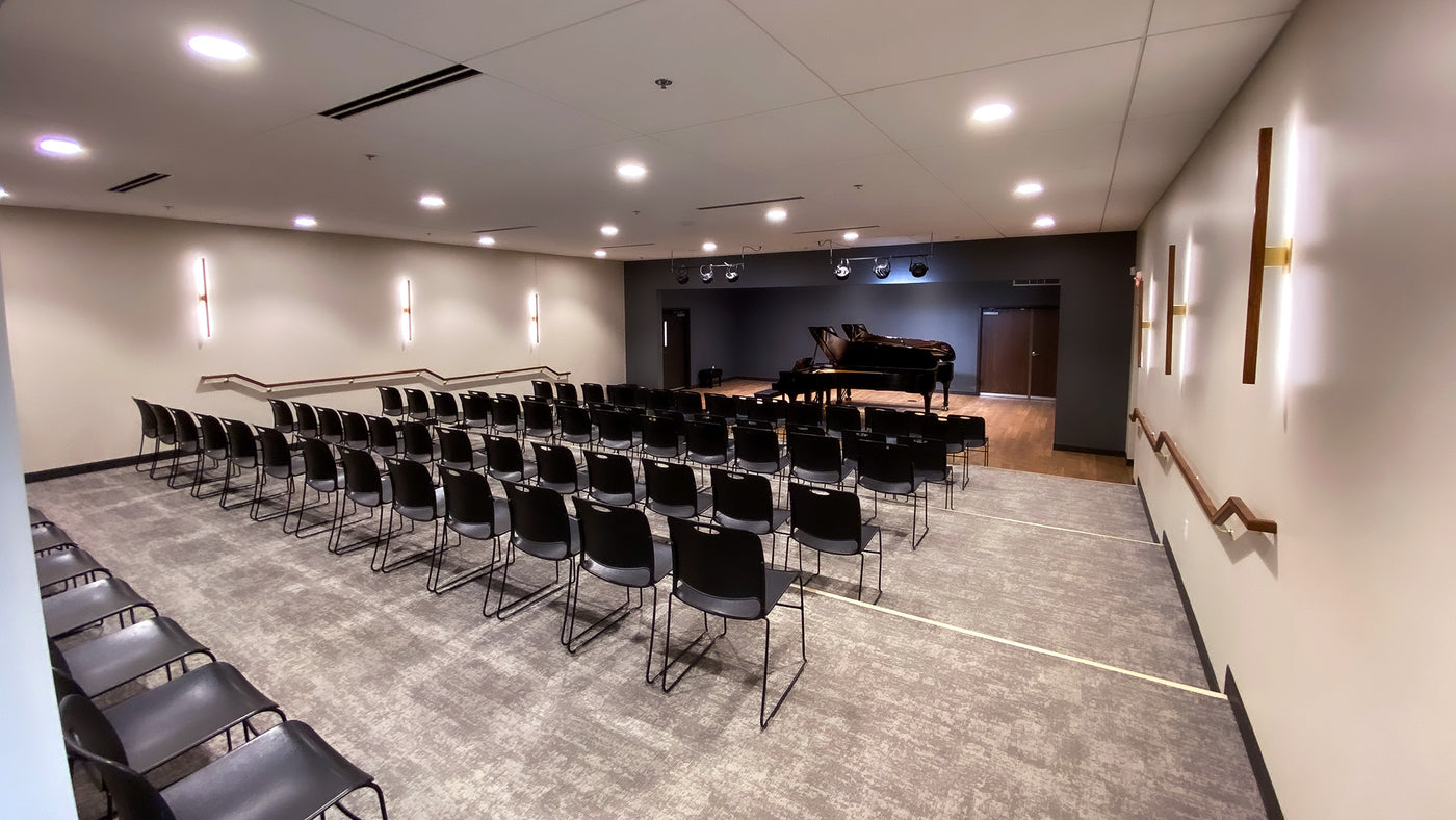 Auditorium with grand piano at Schmitt Music Bloomington