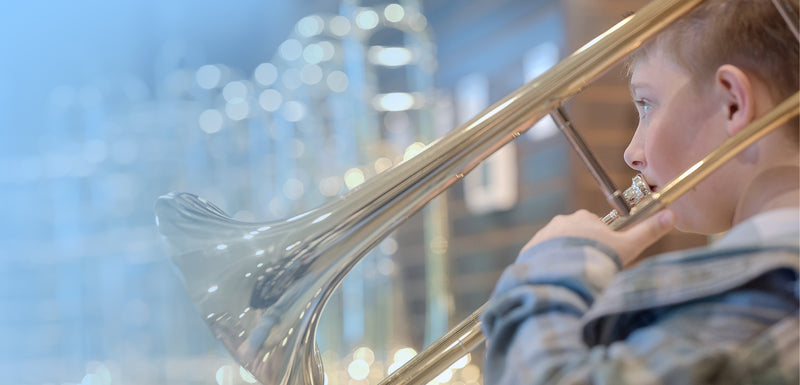 Child playing an instrument