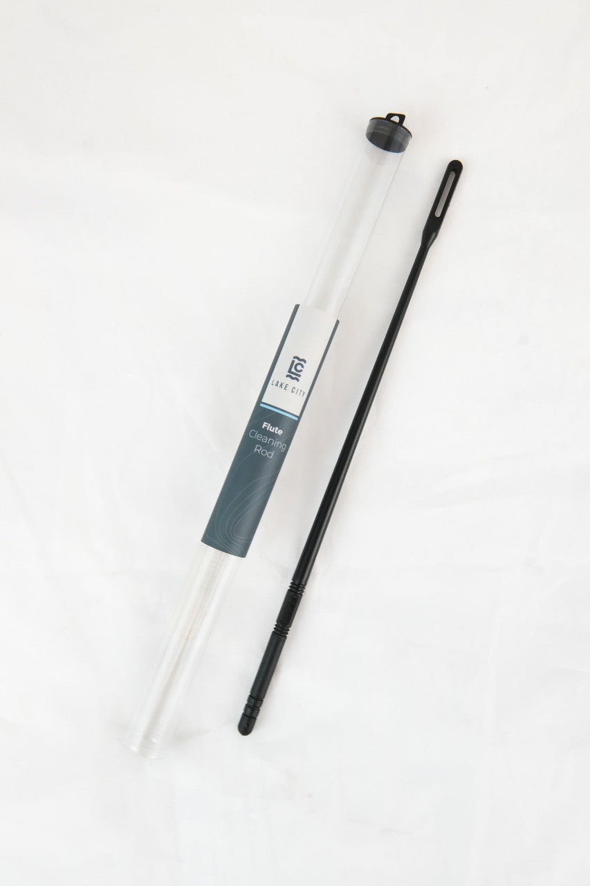 The Lake City Plastic Flute Rod sitting outside of its tubular packaging case