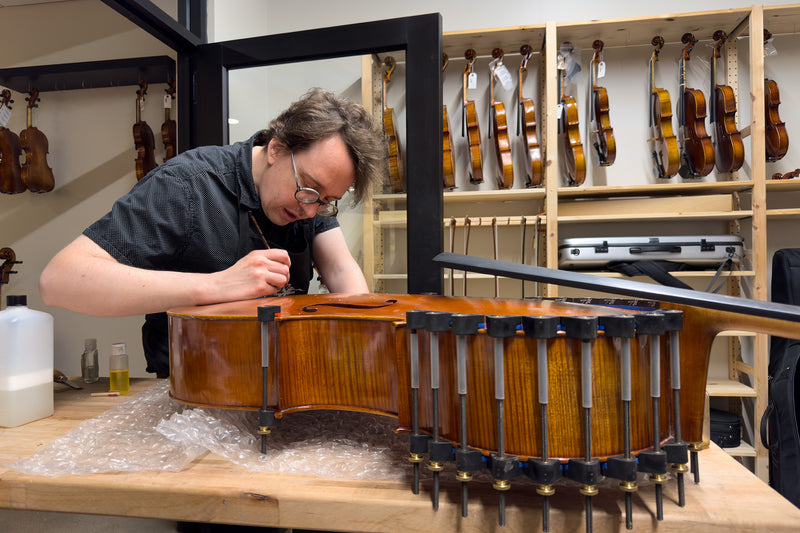 Luthier Nick working on a cello