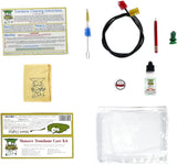 The monster oil trombone care and cleaning kit with all the components laid out neatly