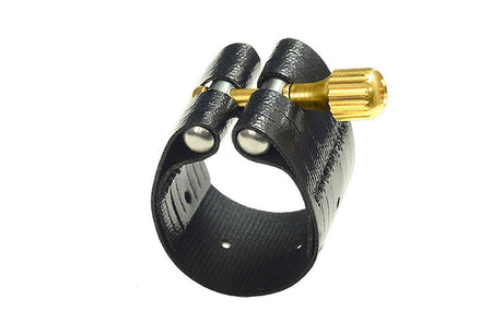 The Rovner Dark 2R saxophone ligature for a standard tenor saxophone mouthpiece, or a slim baritone saxophone mouthpiece. A leathered cloth with a brass nickel screw.