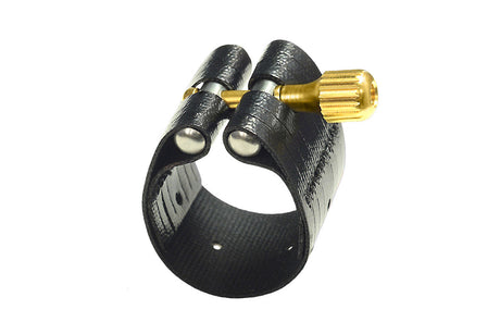 The Rovner Dark 3R Baritone saxophone ligature. A leathered cloth material with a brass screw for tightening.