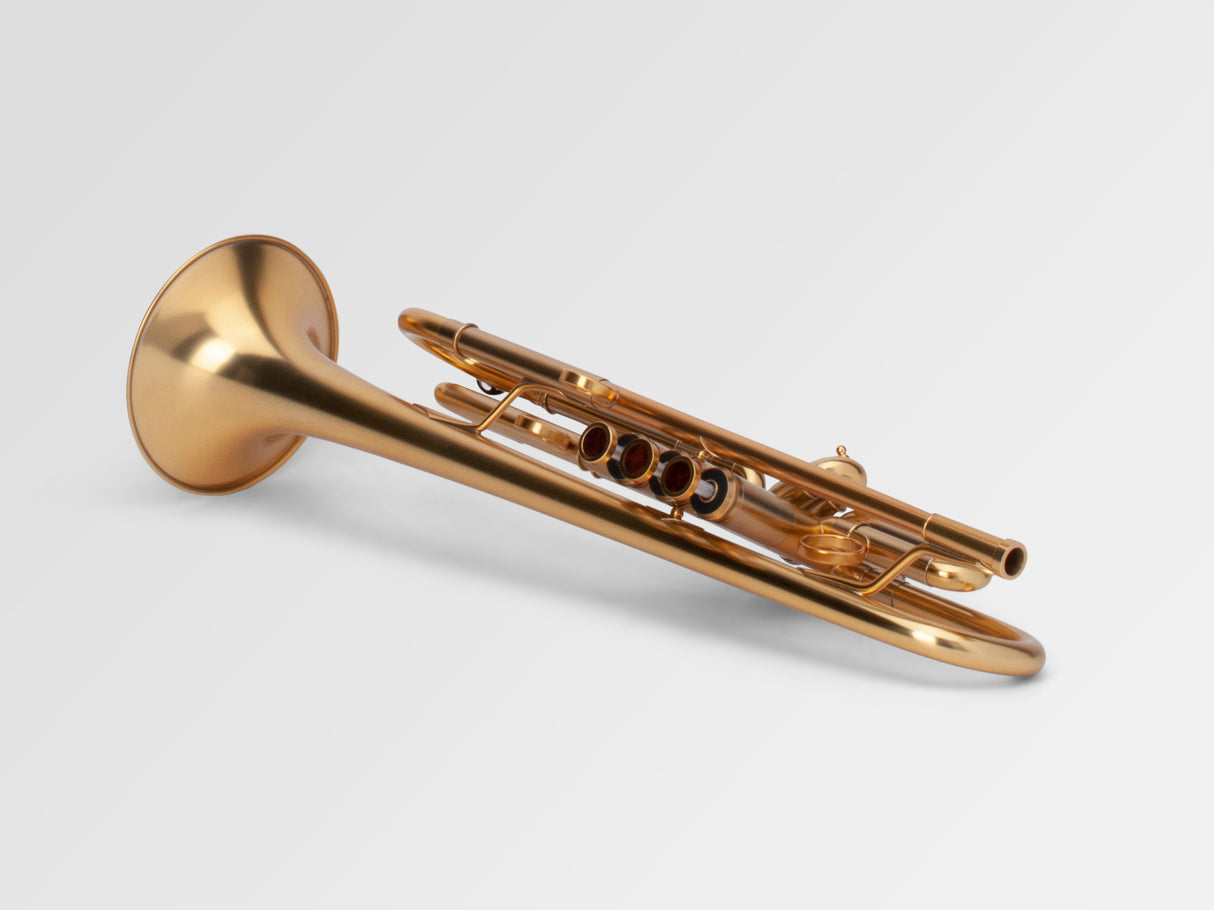 Adams A1 Bb Trumpet - laying down with top of valves in front