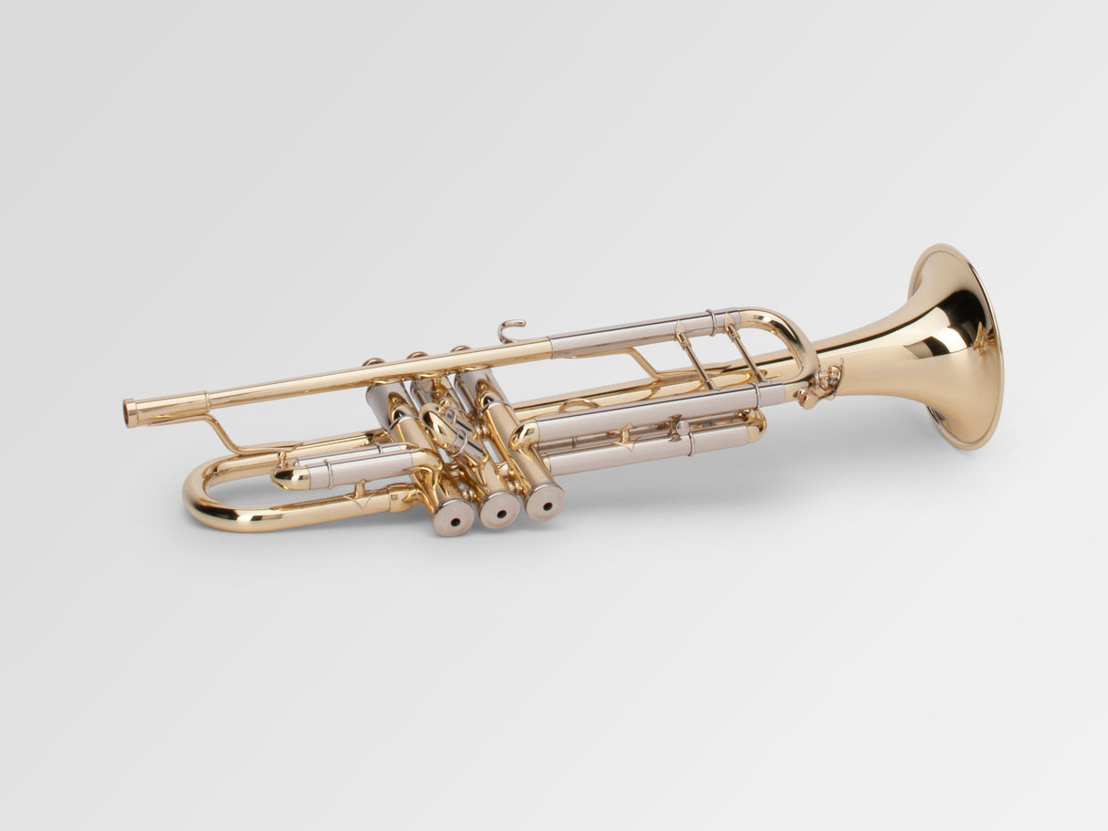 Adams A2 Bb Trumpet - lacquered, laying down, bottom of valves forwards