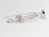 Adams A2 Bb Trumpet - silver, laying down, bottom of valves forwards