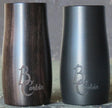 A synthetic and a grenadilla wood B. Corbin Traditional Barrel sitting next to each other.