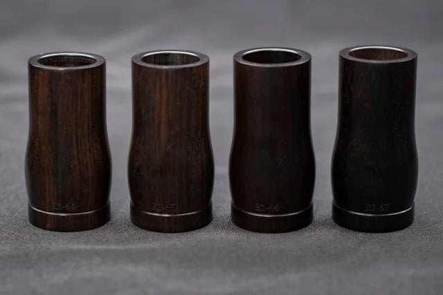 B. Corbin Hawley R1 Clarinet Barrel - all four sizes standing in a row in order of height