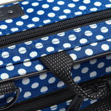 A close up on the stitching of the strap of the Beaumont Blue Polka Dot Box Case