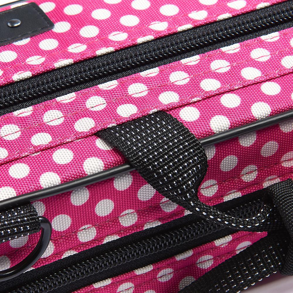 A close up on the stiching of the handle of the Beaumont Pink Polka Dot Flute Box Case