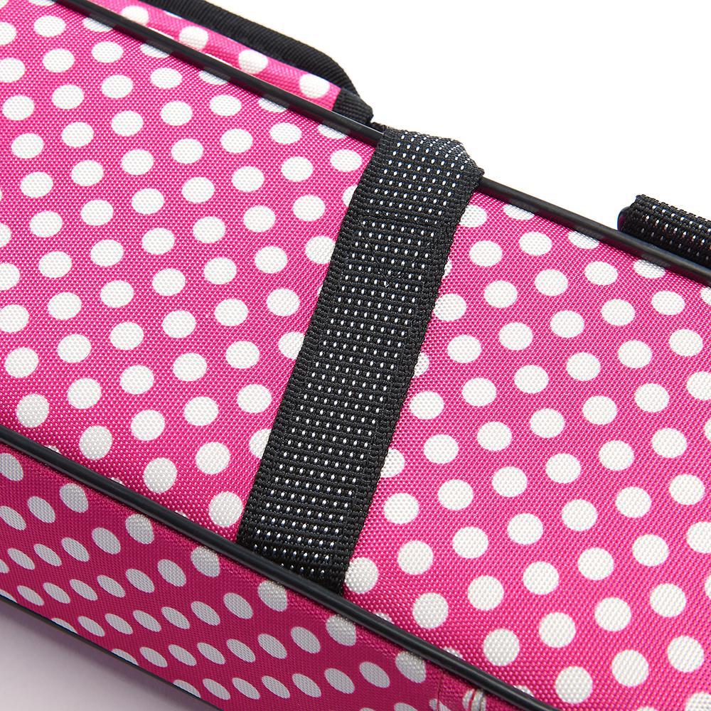 A close up on the stiching of the handle of the Beaumont Pink Polka Dot Flute Box Case