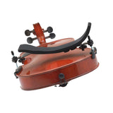 The BonMusica shoulder rest  attached to a violin facing upwards