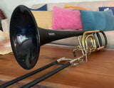 Butler Trombone C12 Bass Trombone - sitting on a coffee table in front of a couch