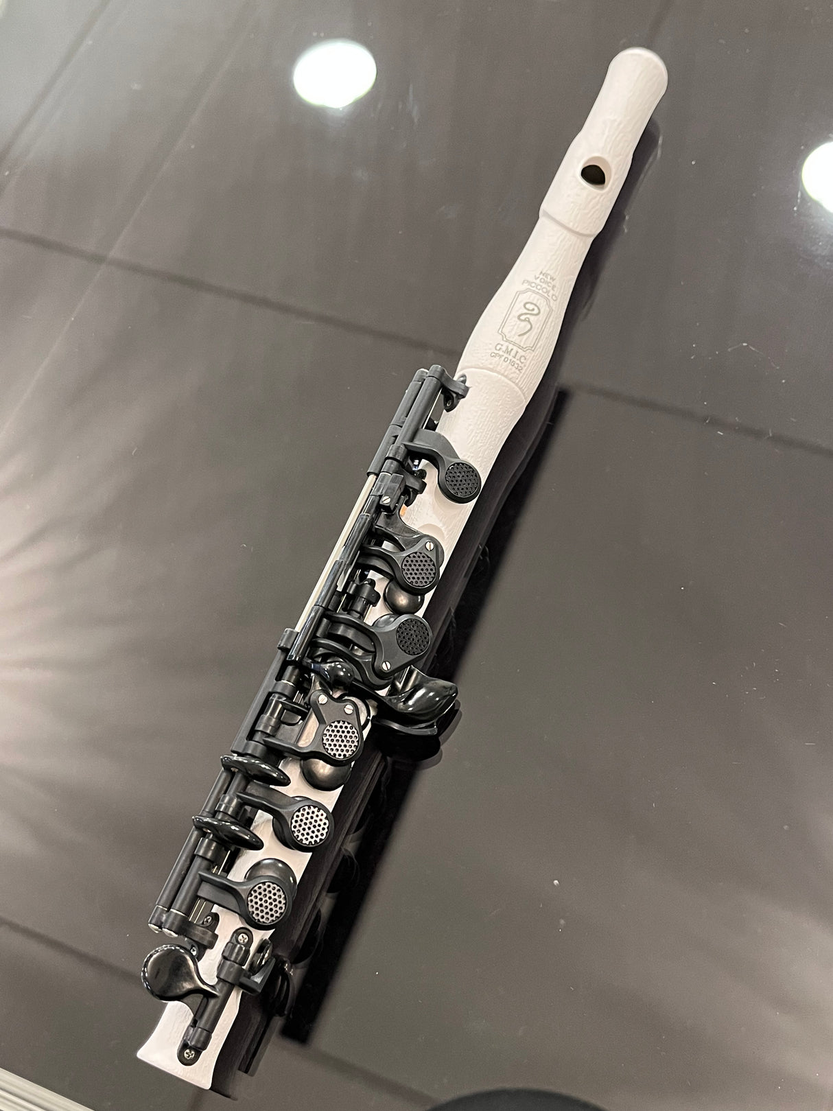 A Consignment Guo New Voice Piccolo - full view out of its case