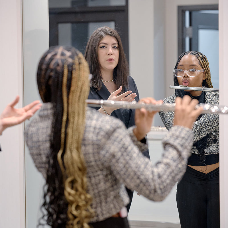 student with a flute