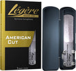 A Legere American Cut baritone saxophone reed in its packaging and one in its carrying case