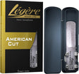 A Legere American Cut tenor saxophone reed in its packaging and one in its carrying case