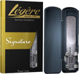 A Legere Signature baritone saxophone reed in its packaging and one in its carrying case