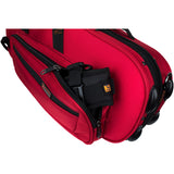 The Protect BPSTRAP backpack strap - folded up, partially placed in a pocket of a protec case 