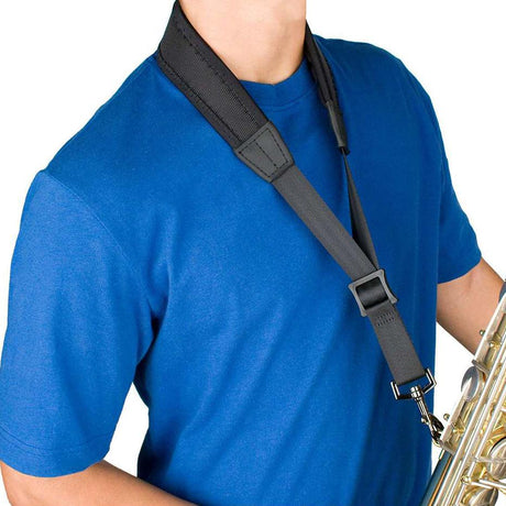 The Protec NLS310M or NLS305M neoprene less stress saxophone neck strap being worn by a model