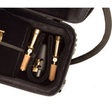 A  close up on the neck piece pocket, with neck pieces in it, of the Protec Propac PB310 case