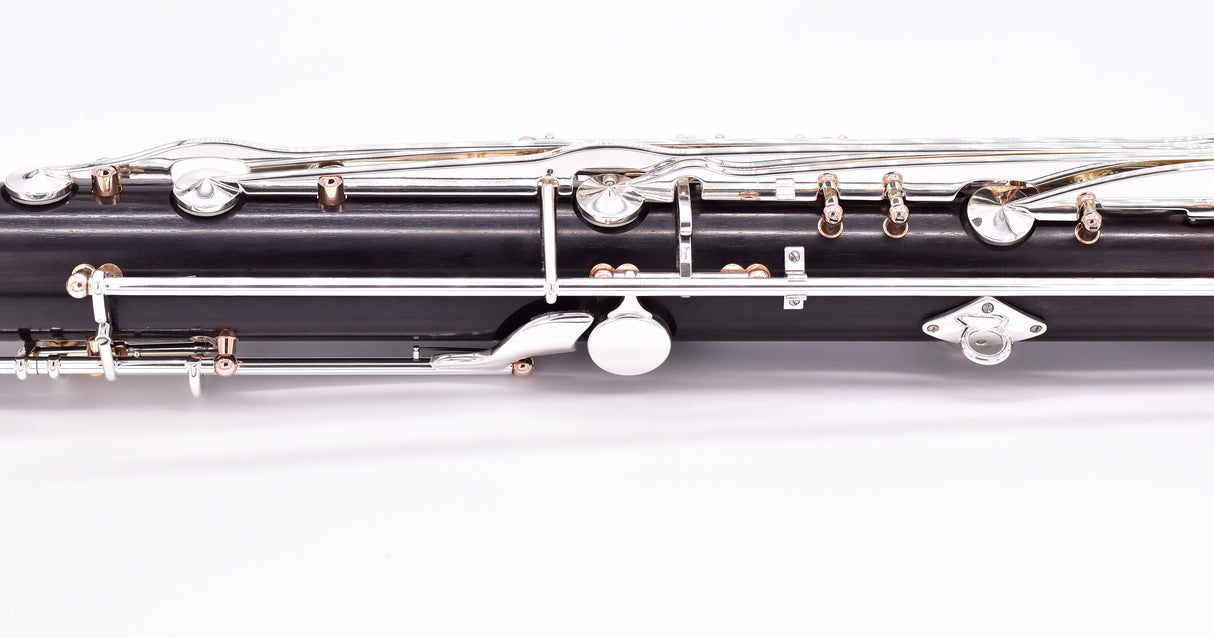 Royal Global Firebird Low C Bass Clarinet - side view of upper joint on its side