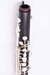 Royal Global Firebird Low C Bass Clarinet - Royal Global Firebird Low C Bass Clarinet - close up of upper joint and brand insignia