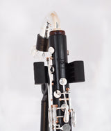 Royal Global Firebird Low C Bass Clarinet - close up of upper joint and neck attached and resting on a stand