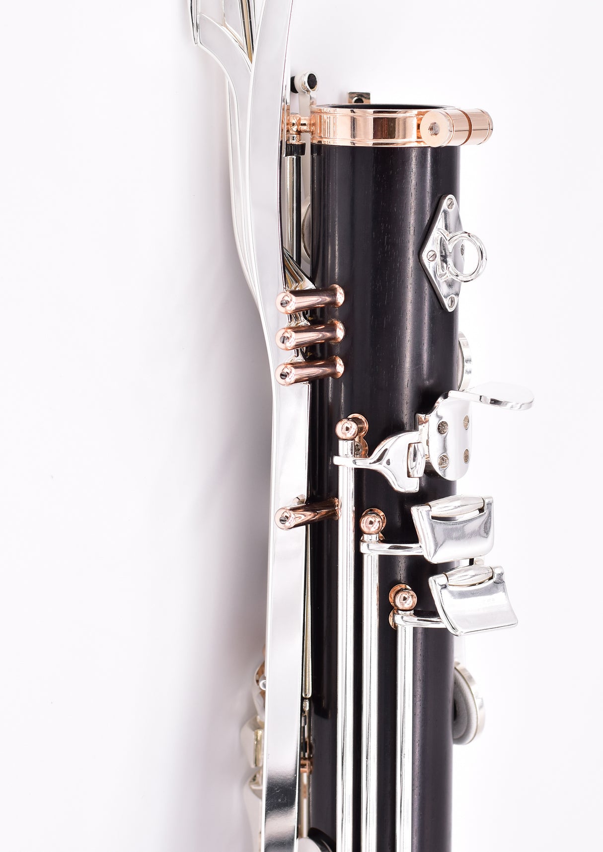 Royal Global Firebird Low C Bass Clarinet - close up side view of the back side of the upper half of the lower joint