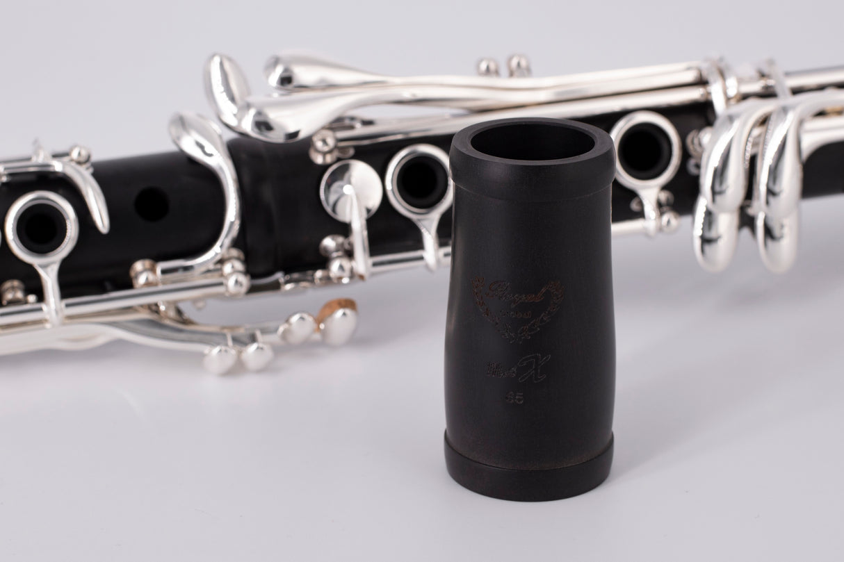 Royal Global Max Bb Clarinet - close up on the barrel sitting in front of the clarinet that's laying down