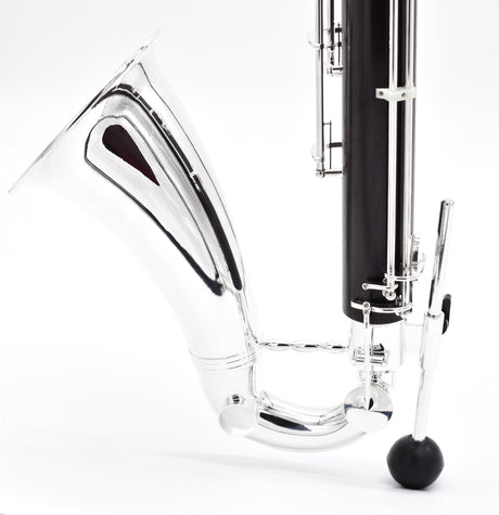 Royal Global Polaris Low C Bass Clarinet  - close up on the bell attached to the lower joint sitting on its peg