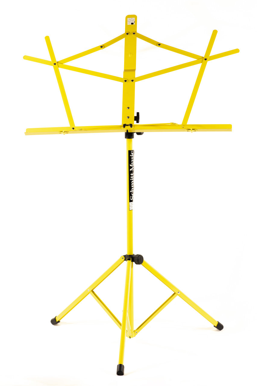 Yellow Schmitt Music folding music stand standing upright with its facing support flared open