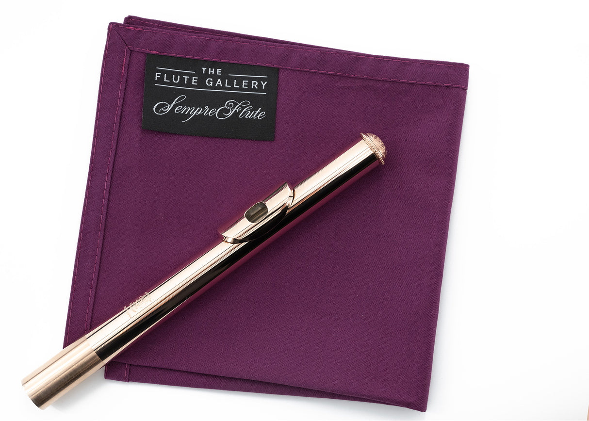 sempre|flute Cleaning Cloth - Flute Gallery, Limited Edition - a flute headjoint sits on top of it