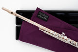 sempre|flute Cleaning Cloth - Flute Gallery, Limited Edition - folded on top of a flute case with the flute on top of it 