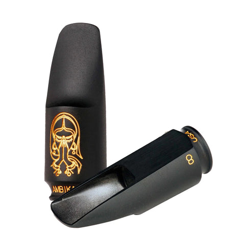 The Theo Wanna Ambika 3 Hard Rubber Soprano Saxophone Mouthpiece - one standing upright, another on its side