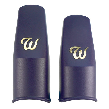 The Theo Wanne Reed Keeper Saxophone mouthpiece cap, both large and small sizes next to each other.