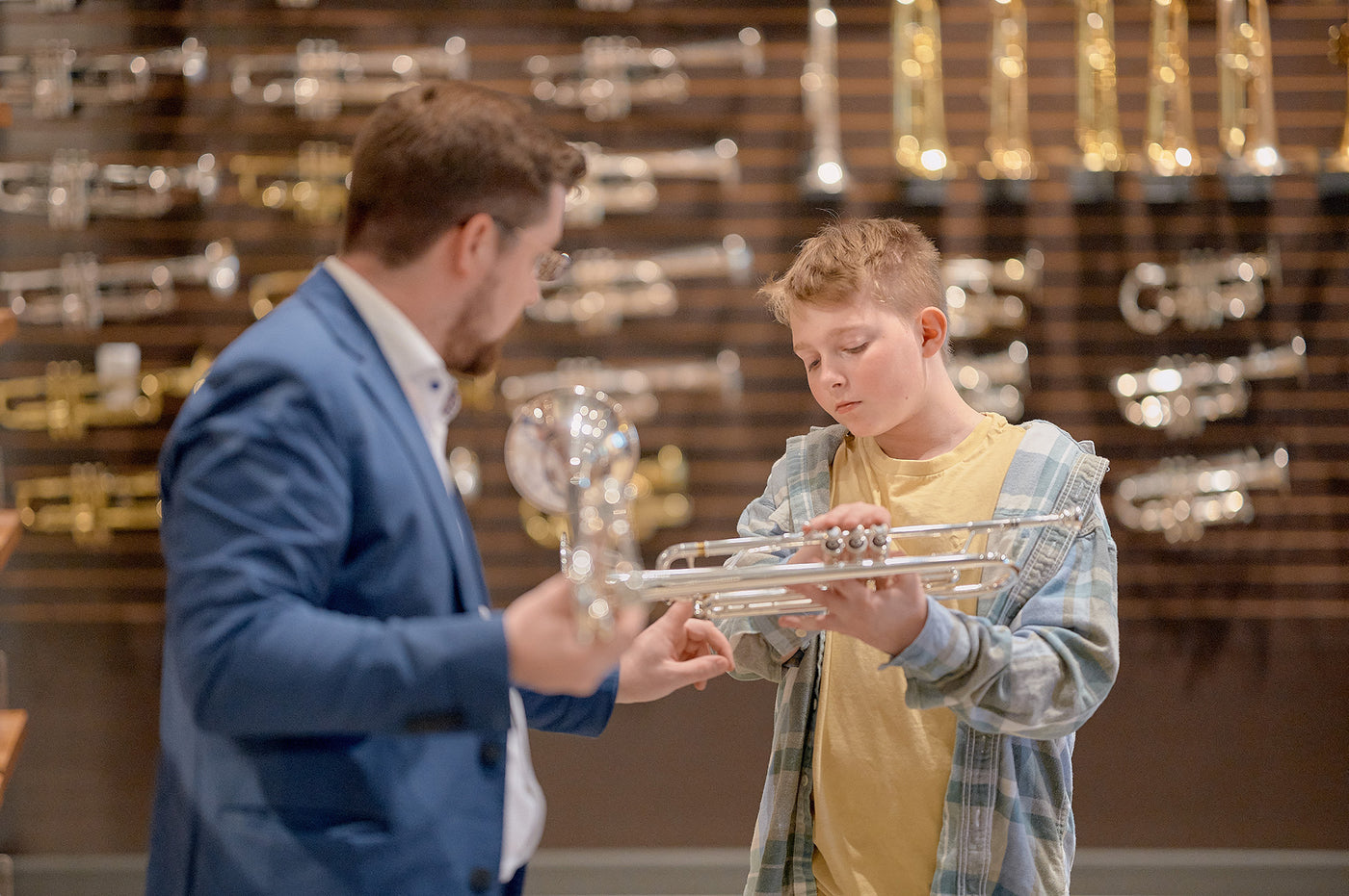 Student holding a trumpet