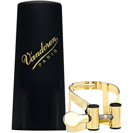 The gold plated Vandoren LC57DP MO alto saxophone ligature and the plastic mouthpiece cap